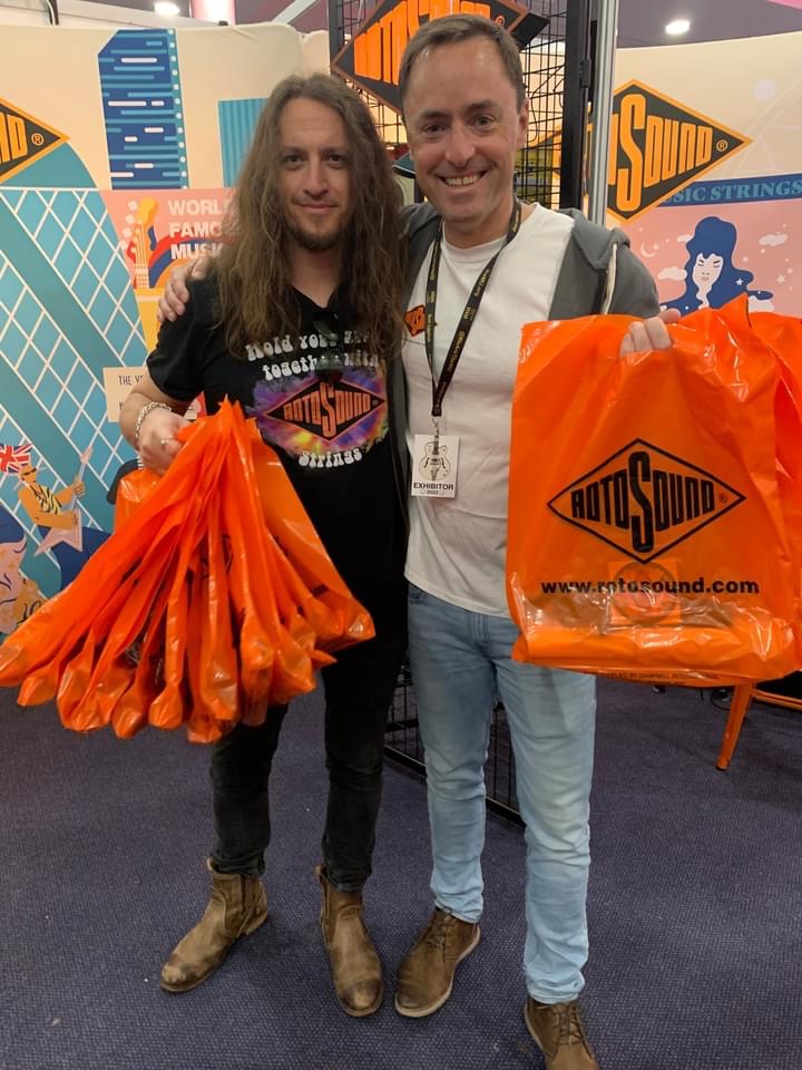 Dan and Zach Frederick at the Rotosound music strings stand at Birmingham guitar show uk 2022